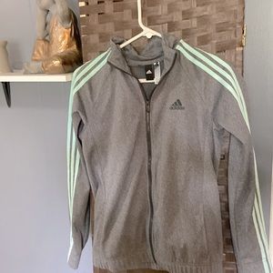 Gray Adidas thin jacket with teal strips on arms.